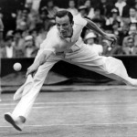 
              FILE - In this July 3, 1936 file photo, Fred Perry of Britain is shown in action in Wimbledon's Men's Singles at the All England Club in Wimbledon, London. When Perry won his third straight Wimbledon in 1936, it’s unlikely that he would have thought it would take another 77 years before another British player would triumph next. But that’s exactly what happened _ Andy Murray ending the drought in 2013. Perry’s name, like Lacoste’s before him, lives on in the fashion label that launched at Wimbledon in 1952. (AP Photo, File)
            