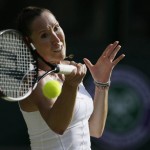 
              Jelena Jankovic of Serbia returns a ball to Petra Kvitova of the Czech Republic during their singles match at the All England Lawn Tennis Championships in Wimbledon, London, Saturday July 4, 2015. (AP Photo/Tim Ireland)
            