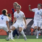 
              England's Lucy Bronze, centre, celebrates with teammate Fara Williams, left, as Jodie Taylor cheers on in the background in the second half of soccer action during the Round of 16 at the FIFA Women's World Cup Monday June 22, 2015 in Ottawa, Ontario, Canada. (Adrian Wyld/The Canadian Press via AP) MANDATORY CREDIT
            
