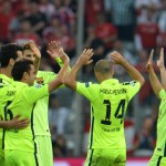 
              Barcelona players celebrate their victory at the end of the soccer Champions League second leg semifinal match between Bayern Munich and FC Barcelona at Allianz Arena in Munich, southern Germany, Tuesday, May 12, 2015. (AP Photo/Kerstin Joensson)
            