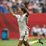 
              United States' Carli Lloyd (10) celebrates her third goal against Japan during first half action in the FIFA Women's World Cup soccer championship in Vancouver, British Columbia, Canada, Sunday, July 5, 2015.   (Jonathan Hayward/The Canadian Press via AP) MANDATORY CREDIT
            