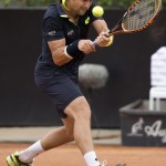
              David Ferrer, of Spain, returns the ball to David Goffin, of Belgium, during a quarter final tennis match at the Italian Open tennis tournament, in Rome, Friday, May 15, 2015. (AP Photo/Andrew Medichini)
            