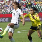 
              United States' Alex Morgan (13) kicks the ball in front ofColombia's Angela Clavijo (13) during first half FIFA Women's World Cup round of 16 action in Edmonton, Alberta, Canada, Monday, June 22, 2015.  (Jason Franson/The Canadian Press via AP) MANDATORY CREDIT
            