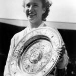 
              FILE - In this July 5, 1952 file photo, Maureen "Little Mo" Connolly, of San Diego, Ca., smiles as she holds her trophy after winning the final in the women's singles at the All England Lawn Tennis Championships in Wimbledon, London.  In the early 1950s, Connolly dominated the world of tennis in much the same way as Helen Wills Moody did in the years before World War II. “Little Mo” won three straight Wimbledon titles from 1952-54, and in 1953 the Californian became the first woman to win the Grand Slam _ all four majors in the same year. The Associated Press named her “Female Athlete of the Year” for three years in a row in the early 1950s. Connolly died in 1969 at 34 after a long battle with cancer. (AP Photo, File)
            