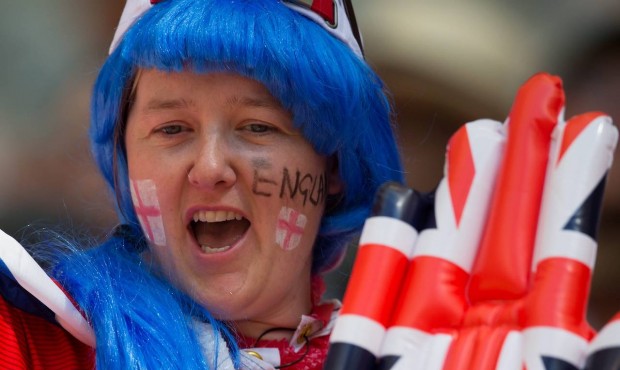 A England fan cheers while waiting for Canada and England to play a FIFA Women’s World Cup qu...