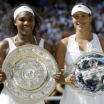 
              Serena Williams of the United States, left and  Garbine Muguruza of Spain hold up their trophies after the women's singles final against at the All England Lawn Tennis Championships in Wimbledon, London, Saturday July 11, 2015. Williams won 6-4, 6-4. (AP Photo/Kirsty Wigglesworth)
            