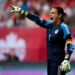 
              FILE - In this June 18, 2014, file photo, Germany's goalkeeper Nadine Angerer calls out instructions to her teammates during the first half of an international friendly soccer game against Canada in Vancouver, British Columbia. Angerer anchors a German team that appears to be in flux. (AP Photo/The Canadian Press, Darryl Dyck, File)
            