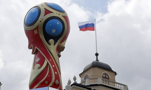 An emblem of the 2018 World Cup stands near the Constantine (Konstantinovsky) Palace in St.Petersbu...