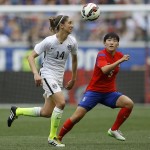
              United States midfielder Morgan Brian, left, and South Korea defender Kim Sooyun chase after the ball during the first half of an international friendly soccer match, Saturday, May 30, 2015, in Harrison, N.J. (AP Photo/Julio Cortez)
            