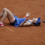 
              France's Alize Cornet celebrates winning her third round match of the French Open tennis tournament against Croatia's Mirjana Lucic-Baroni in three sets 4-6, 6-3, 7-5, at the Roland Garros stadium, in Paris, France, Friday, May 29, 2015. (AP Photo/Thibault Camus)
            