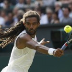 
              Dustin Brown of Germany returns a ball to Rafael Nadal of Spain during their singles match at the All England Lawn Tennis Championships in Wimbledon, London, Thursday July 2, 2015. (AP Photo/Pavel Golovkin)
            