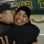 
              Vanderbilt's Astra Sharma, right, gets a kiss from head coach Geoff Macdonald after their team won the NCAA's women's team tennis championships against Oklahoma, Tuesday, May 19, 2015, Waco, Texas. (AP Photo/LM Otero)
            