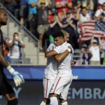 
              United States' DeAndre Yedlin, right, and Clint Dempsey celebrate after Dempsey's goal against Panama goalkeeper Luis Mejia, left, during the second half of the CONCACAF Gold Cup third place soccer match, Saturday, July 25, 2015, in Chester, Pa. (AP Photo/Michael Perez)
            