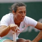 
              Italy's Francesca Schiavone reacts as she plays Romania's Andreea Mitu during their third round match of the French Open tennis tournament at the Roland Garros stadium, Saturday, May 30, 2015 in Paris.  (AP Photo/Christophe Ena)
            