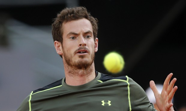 Andy Murray of Britain eyes the ball before returning to Rafael Nadal of Spain during the men&#8217...
