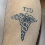
              In this photo taken May 14, 2015, in Stanford, Calif., United States soccer player Jordan Morris shows his tattooed forearm in Stanford, Calif., that shares he has diabetes. Morris has Type 1 diabetes, so getting the symbol for his disease inked on his right forearm serves dual purposes: as medical identification if needed and also as a reminder to the Stanford star what he has endured to become a contributor for the U.S. men's national team at age 20. Not that he intended to ever do it. (AP Photo/Janie McCauley)
            