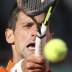 
              Serbia's Novak Djokovic returns the ball to France's Richard Gasquet during their fourth round match of the French Open tennis tournament at the Roland Garros stadium, Monday, June 1, 2015 in Paris.  (AP Photo/David Vincent)
            