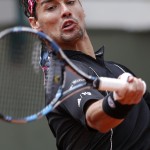 
              Italy's Fabio Fognini returns the ball to Japan's Tatsuma Ito during their first round match of the French Open tennis tournament at the Roland Garros stadium, Monday, May 25, 2015 in Paris,  (AP Photo/Christophe Ena)
            