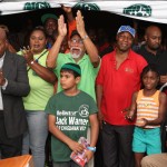 
              Supporters cheer for former FIFA vice president Jack Warner as speaks at a political rally in Marabella, Trinidad and Tobago, Wednesday, June 3, 2015.  Indicted on charges of racketeering, wire fraud and money-laundering, Warner is officially an internationally wanted man. In Trinidad, they've heard this all before, many times, though many residents of his homeland say that if Warner amassed his riches without taking from them, then they're fine with the arrangement. (AP Photo/Anthony Harris)
            