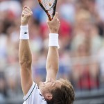 
              Nicolas Mahut of France reacts after winning the men’s final against David Goffin of Belgium at the open grass court tournament in Rosmalen, central Netherlands, Sunday, June 14, 2015.(AP Photo/Ermindo Armino)
            