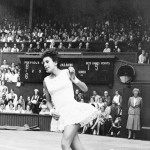 
              FILE - In this July 2, 1960 file photo, Brazil's Maria Bueno tosses her racquet high in the air and rushes the net to shake hands with her opponent after winning her second straight singles tennis title at the All England Lawn Tennis Championships in Wimbledon, London. Bueno has been credited with spreading women’s tennis around the world. The Brazilian was the first woman from outside the U.S. and Western Europe to win Wimbledon when she triumphed in 1959. Later that year, she became the first non-U.S. woman to win both Wimbledon and the U.S. national championships. The Associated Press named her “Female Athlete of the Year” in 1959. She would go on to win another two Wimbledon titles. (AP Photo, File)
            