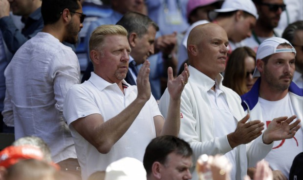 Former Wimbledon champion Boris Becker, the coach of Novak Djokovic of Serbia applauds, during the ...