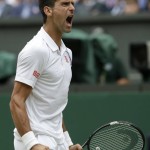
              Novak Djokovic of Serbia celebrates winning a point during the men's singles final against Roger Federer of Switzerland at the All England Lawn Tennis Championships in Wimbledon, London, Sunday July 12, 2015. (AP Photo/Alastair Grant)
            