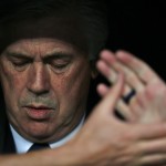 
              FILE - In this May 13, 2015, file photo, Real Madrid's coach Carlo Ancelotti takes his place in the dugout prior to the Champions League second leg semifinal soccer match between Real Madrid and Juventus, at the Santiago Bernabeu stadium in Madrid. Real Madrid has fired coach Carlo Ancelotti, one season after he led the club to its 10th European Cup title. Club president Florentino Perez said Monday, May 25, 2015,  that Ancelotti's successor would be announced next week. (AP Photo/Daniel Ochoa de Olza, File)
            