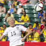 
              United States' Megan Rapinoe (15) heads the ball against Colombia during first half FIFA Women's World Cup round of 16 soccer action in Edmonton, Alberta, Canada, Monday, June 22, 2015.  (Jason Franson/The Canadian Press via AP) MANDATORY CREDIT
            