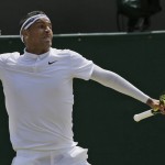 
              Nick Kyrgios of Australia celebrates winning a point against Milos Raonic of Canada, during their singles match at the All England Lawn Tennis Championships in Wimbledon, London, Friday July 3, 2015. (AP Photo/Tim Ireland)
            