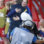 
              United States head coach Jill Ellis and Sweden head coach Pia Sundhage embrace prior to FIFA Women's World Cup soccer action in Winnipeg, Manitoba, Canada, Friday, June 12, 2015. (John Woods/The Canadian Press via AP) MANDATORY CREDIT
            