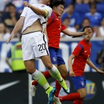 
              United States forward Abby Wambach, left, and South Korea defender Kim Sooyun go up for the ball during the first half of an international friendly soccer match, Saturday, May 30, 2015, in Harrison, N.J. (AP Photo/Julio Cortez)
            