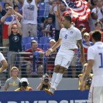 
              United States' Clint Dempsey (8) celebrates his goal against Cuba during the first half of a CONCACAF Gold Cup soccer quarterfinal match, Saturday, July 18, 2015, in Baltimore. (AP Photo/Patrick Semansky)
            