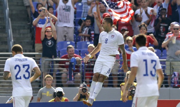 United States’ Clint Dempsey (8) celebrates his goal against Cuba during the first half of a ...
