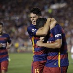 
              FC Barcelona's Luis Suarez, right, celebrates his goal with Marc Bartra during the first half of an International Champions Cup soccer match, Tuesday, July 21, 2015, in Pasadena, Calif. (AP Photo/Jae C. Hong)
            