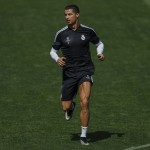 
              Real Madrid's Cristiano Ronaldo from Portugal runs during a training session at the Valdebebas Stadium in Madrid, Spain, Tuesday, May 12, 2015. Real Madrid will play against Juventus in a second leg semifinal Champions League soccer match on Wednesday. (AP Photo/Daniel Ochoa de Olza)
            