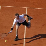 
              Britain's Andy Murray returns in his semifinal match of the French Open tennis tournament against Serbia's Novak Djokovic at the Roland Garros stadium, in Paris, France, Friday, June 5, 2015. (AP Photo/Michel Euler)
            