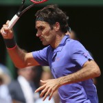 
              Switzerland's Roger Federer returns the ball to France's Gael Monfils during their fourth round match of the French Open tennis tournament at the Roland Garros stadium, Monday, June 1, 2015 in Paris. Federer won 6-3, 4-6, 6-4, 6-1. (AP Photo/David Vincent)
            