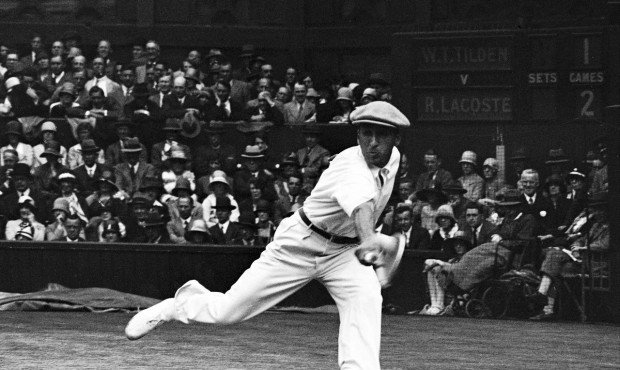 FILE – In this July 4, 1928 file photo, French tennis champion Rene Lacoste returns a shot, d...