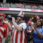 
              Soccer fans applaud during a news conference Monday, July 27, 2015, in St. Louis. The news conference was held to announce the U.S. soccer team will play its first qualifier for the 2018 World Cup at Busch Stadium in St. Louis on Nov. 13, 2015. (AP Photo/Jeff Roberson)
            