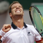 
              France's Richard Gasquet celebrates as he plays Argentina's Carlos Berlocq during their second round match of the French Open tennis tournament at the Roland Garros stadium, Friday, May 29, 2015 in Paris. (AP Photo/Francois Mori)
            