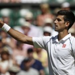 
              Novak Djokovic of Serbia gestures during the men's singles semifinal match against Richard Gasquet of France at the All England Lawn Tennis Championships in Wimbledon, London, Friday July 10, 2015. (Adrian Dennis, Pool Photo via AP)
            