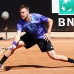 
              Jack Sock from US returns the ball to France's Gilles Simon during their match at the Italian Open tennis tournament, in Rome, Monday, May 11, 2015. (AP Photo/Felice Calabro')
            