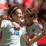 
              England's Jodie Taylor, left, and Jill Scott celebrate Taylor's goal against Canada during the first half in a quarterfinal of the Women's World Cup soccer tournament, Saturday, June 27, 2015, in Vancouver, British Columbia, Canada. (Darryl Dyck/The Canadian Press via AP
            