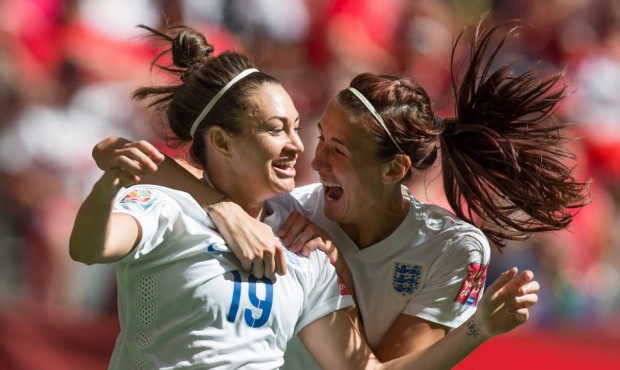England’s Jodie Taylor, left, and Jill Scott celebrate Taylor’s goal against Canada dur...