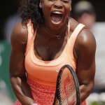 
              Serena Williams of the U.S. screams as she defeats Italy's Sara Errani in the quarterfinal match of the French Open tennis tournament in two sets 6-1, 6-3, at the Roland Garros stadium, in Paris, France, Wednesday, June 3, 2015. (AP Photo/Christophe Ena)
            