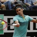 
              Roger Federer, of Switzerland, returns the ball to Tomas Berdych, of Czech Republic, during a quarter final match at the Italian Open tennis tournament, in Rome, Friday, May 15, 2015. Roger Federer kept alive his pursuit of an elusive clay-court title with a routine 6-3, 6-3 win over sixth-seeded Tomas Berdych on Friday to reach the Italian Open semifinals. (AP Photo/Alessandra Tarantino)
            