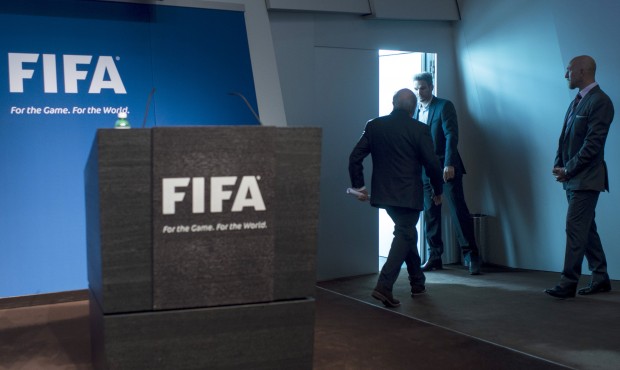 FIFA President Sepp Blatter leaves after speaking at a press conference at the FIFA headquarters in...