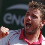 
              Switzerland's Stan Wawrinka clenches his fist after scoring a point in the semifinal match of the French Open tennis tournament against France's Jo-Wilfried Tsonga at the Roland Garros stadium, in Paris, France, Friday, June 5, 2015. (AP Photo/Michel Euler)
            