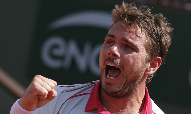 Switzerland’s Stan Wawrinka clenches his fist after scoring a point in the semifinal match of...